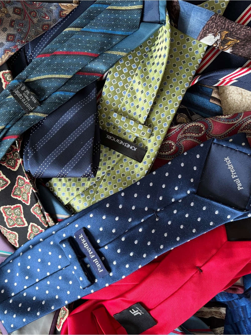 30 ties featuring Pierre Cardin, Paul Fredrick, Jones New York, Van Heusen